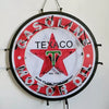 Gasoline oil neon sign with red circular face, Texaco star, and hanging hooks