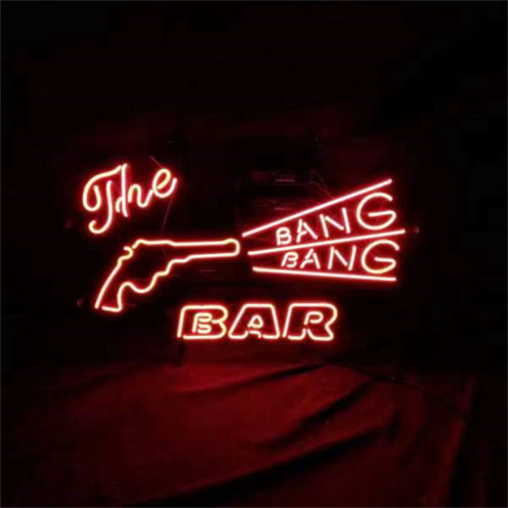Red glowing gun neon sign reading 'The' and 'BANG' with 'BAR' below