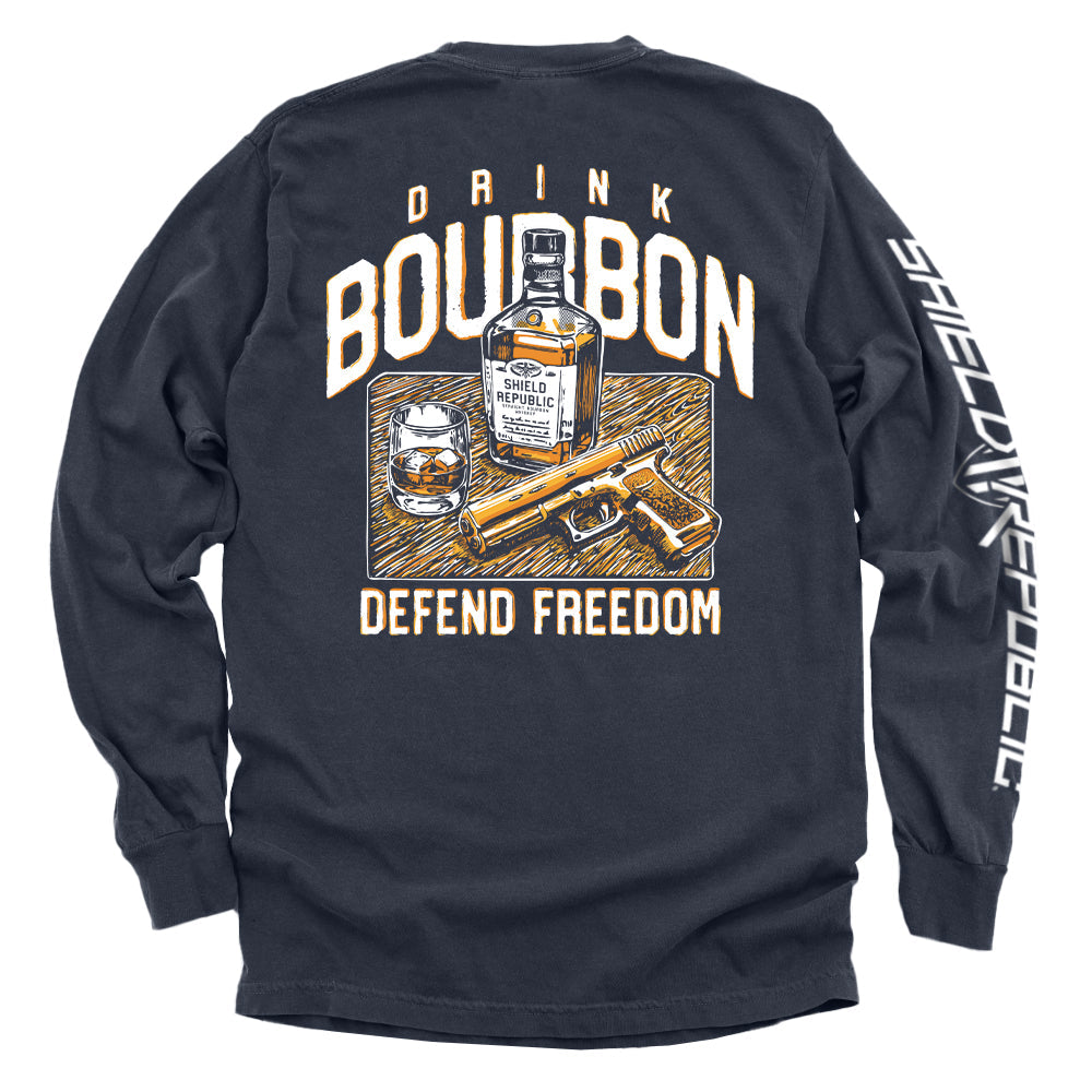 Navy long-sleeve shirt with back graphic: bourbon bottle, DRINK/BOURBON text, DEFEND FREEDOM