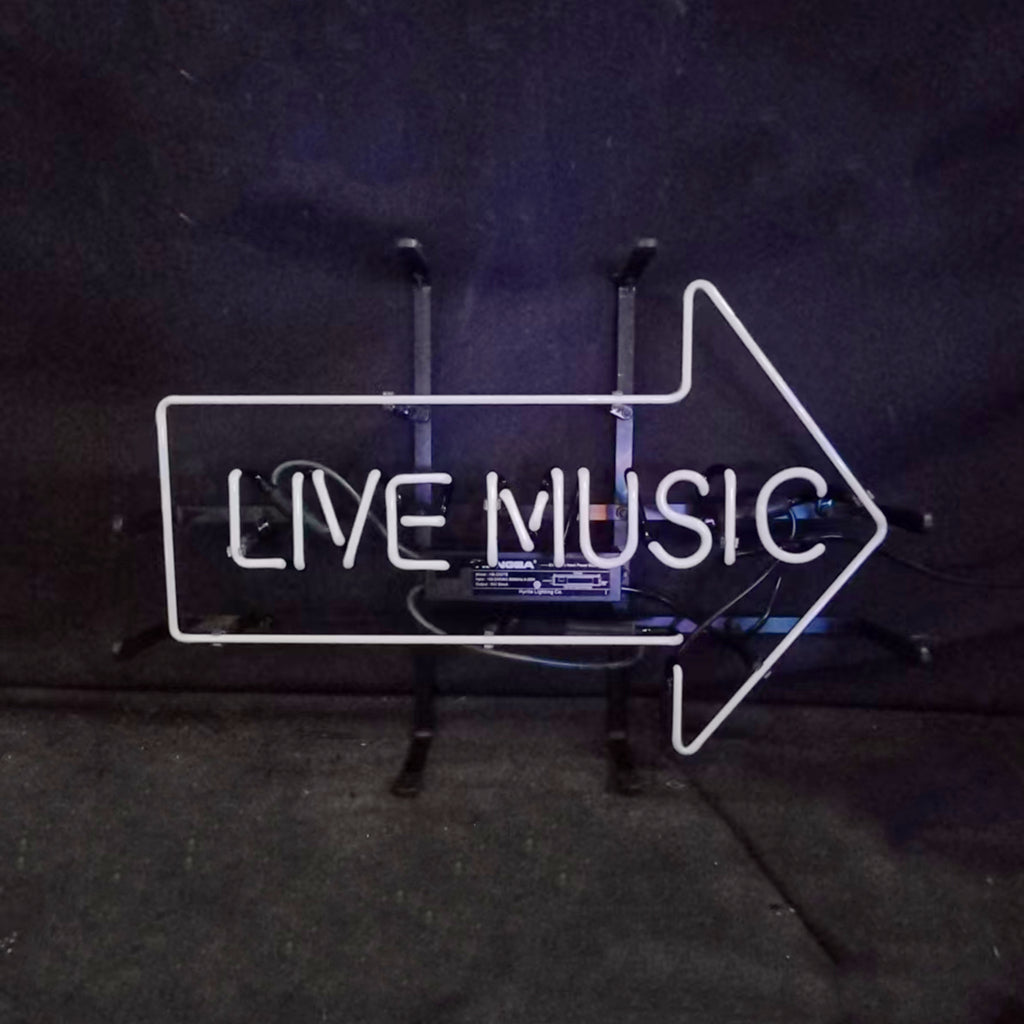 Neon sign with right arrow and LIVE MUSIC text, white outline with dim cool glow