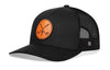 Black trucker hat with orange leather patch of crossed golf clubs and mesh side panels