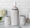 Gift set bottle cooler and two wine tumblers, white finish on countertop