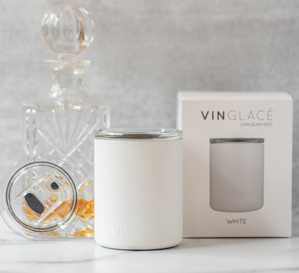 White glass-lined lowball whiskey tumbler with lid, plus VINGLACE product box in view