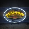 Oval neon light sign with 'World Famous' and 'Deadwood Tobacco Co.' lettering