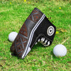 Black canvas putter cover with white laces and star patch, brown patterned design