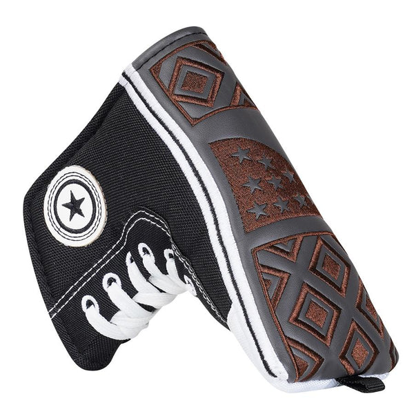 Black canvas putter cover with white laces and star emblem, brown patterned side panel