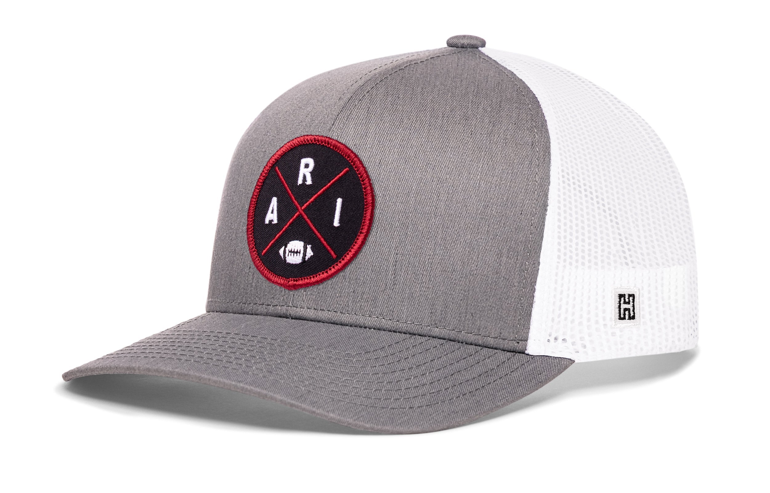 Heather gray front trucker hat with red round logo patch, white mesh sides, snapback.