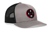 Heather gray front trucker hat with red round logo patch, black mesh sides, snapback.