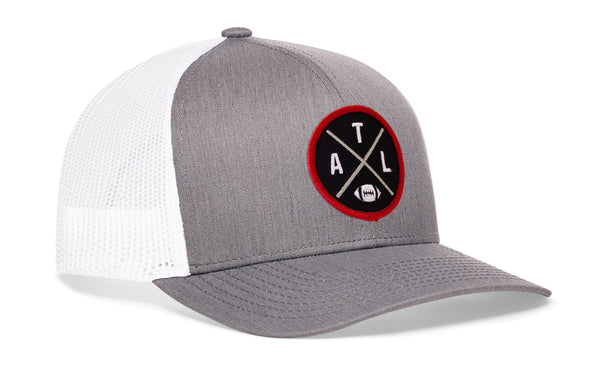 Gray front trucker cap with white mesh side panels and red AXL logo patch.