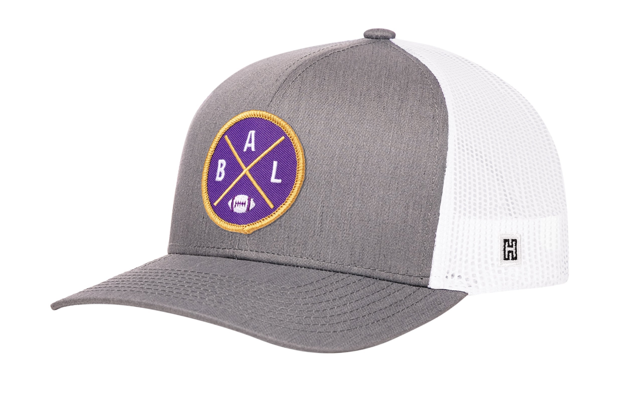 Gray and white trucker snapback hat with round BALX logo patch and mesh side panels