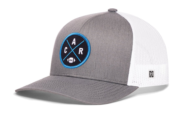 Gray-and-white trucker cap with mesh sides and round CAR X badge on the front, snapback.