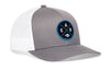 Gray-and-white trucker cap with mesh back and round CAR X badge on the front, snapback.