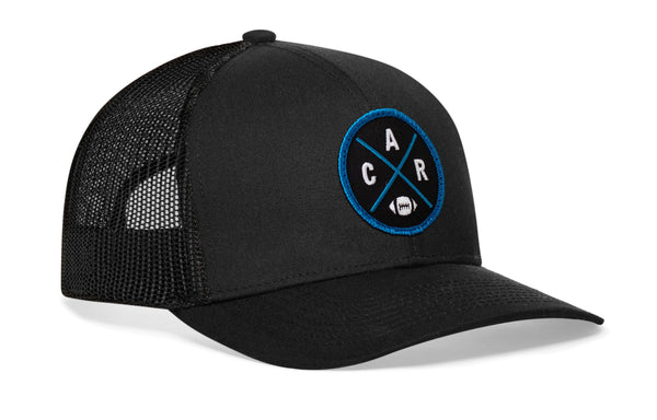 Black trucker cap with mesh sides and round CAR X badge on the front, snapback closure.
