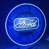 Round blue neon sign showing “Ford” script and “Lincoln” text inside a glowing ring