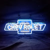 Chevrolet neon bowtie logo sign with blue outline and bright CHEVROLET lettering
