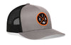 Gray trucker cap with black mesh back, curved brim, and orange circular logo patch.