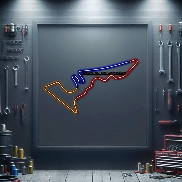 Neon race track metal sign with blue and red outline on dark panel