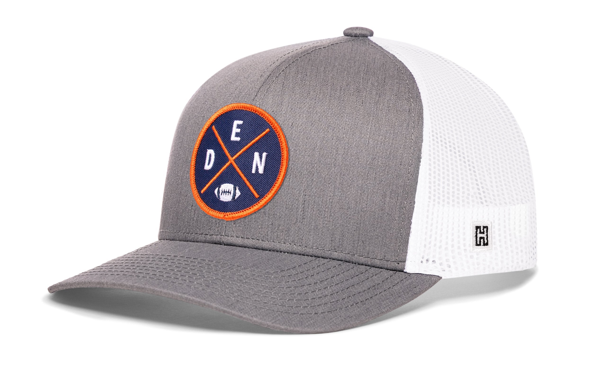 Gray-and-white trucker hat with round DEN X logo patch and white mesh side panels