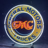 Neon circular sign with 'General Motors' and 'Trucks' text around GM CMC logo.