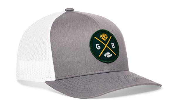 Gray-and-white trucker hat with green GB logo patch and mesh side panels.