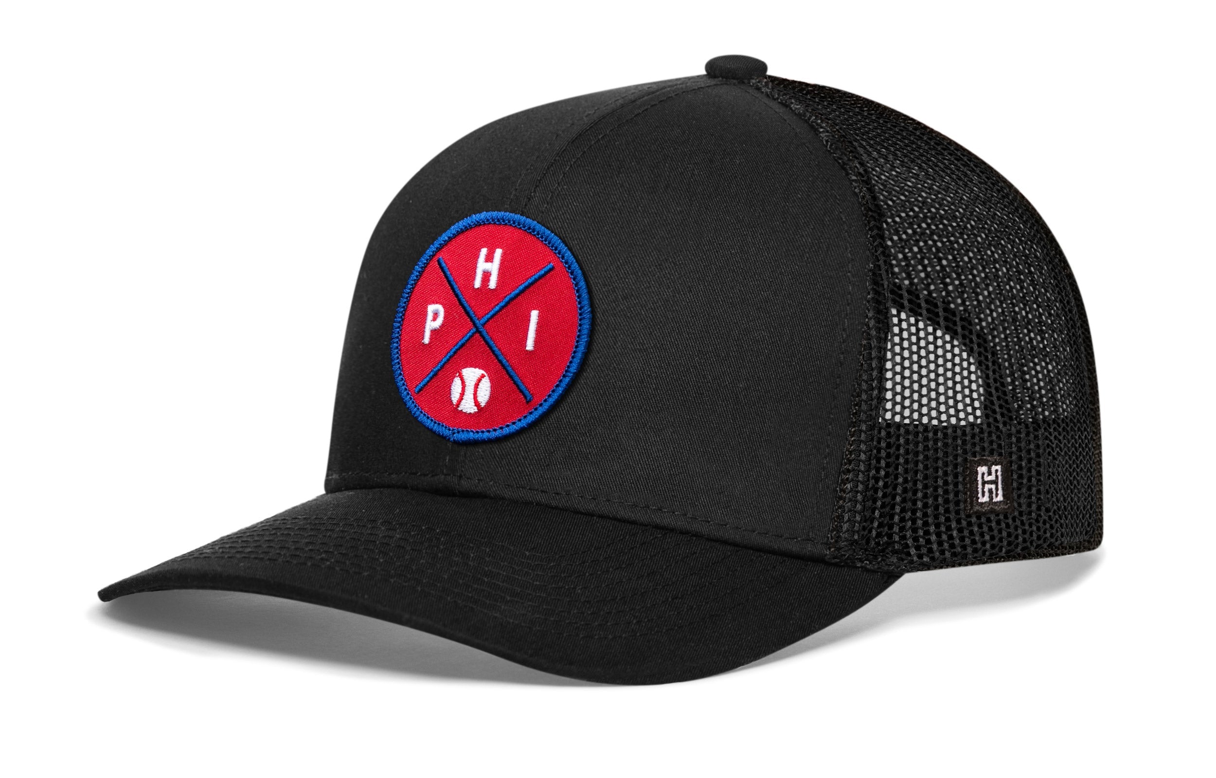 Black trucker hat with front logo patch, curved brim, and mesh back panel