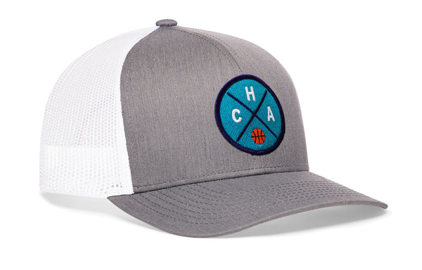 Gray front basketball trucker hat with white mesh back and blue round logo patch