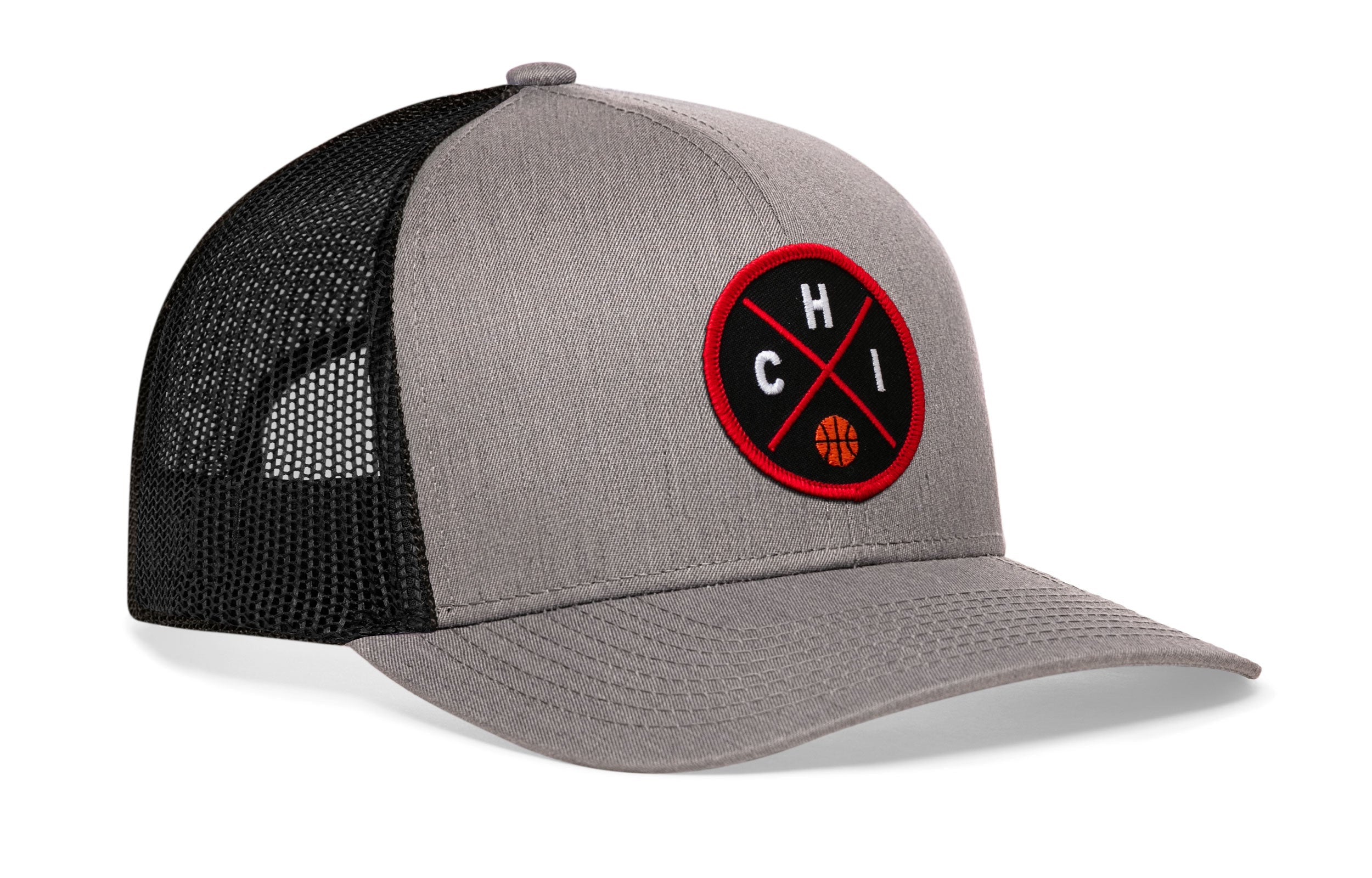 Gray front trucker cap with black mesh back and red circular front logo patch