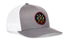 Gray trucker cap with white mesh back and circular logo patch on the front