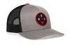 Gray trucker snapback cap with front logo patch and black mesh side panels