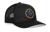 Black trucker snapback hat with front-right circular logo patch and mesh back panel.