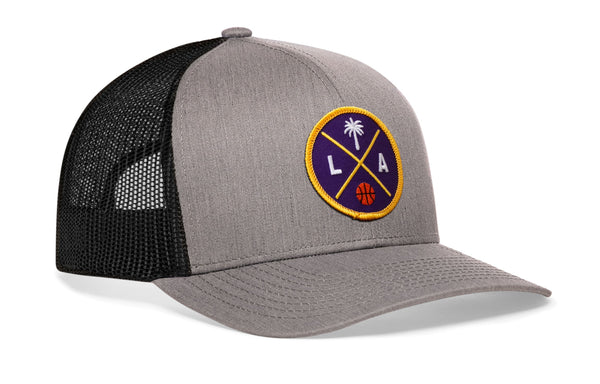 Gray front with black mesh trucker hat and circular LA graphic patch