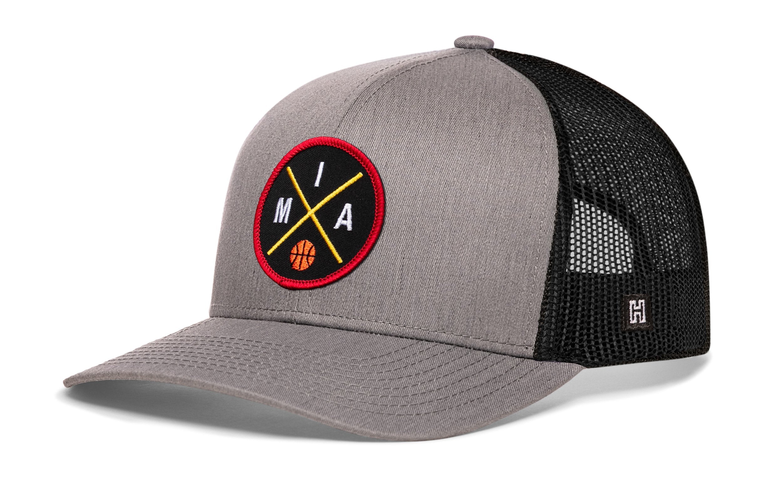 Gray and black mesh trucker snapback cap with circular basketball logo patch on front