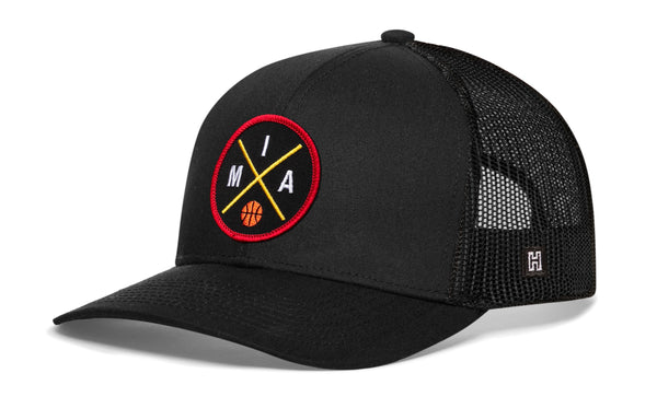 Black 5-panel basketball snapback hat with circular team logo and mesh side panels.