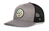 Gray-and-black trucker cap with snapback, mesh sides, green front logo patch, side H tag