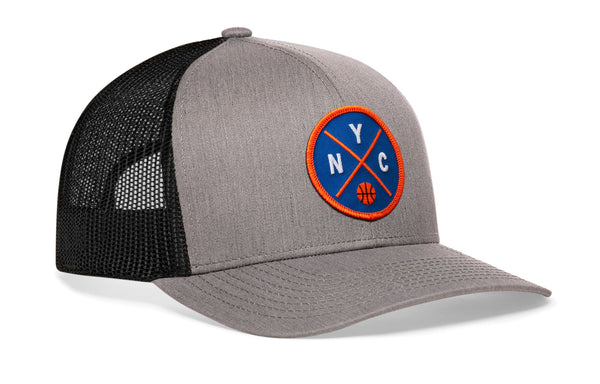 Gray front basketball trucker cap with black mesh back, blue-and-orange NYC patch