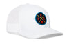 White trucker hat with mesh sides and circular team logo patch on the front panel.