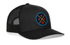 Black trucker hat with mesh sides and circular team logo patch on the front panel.
