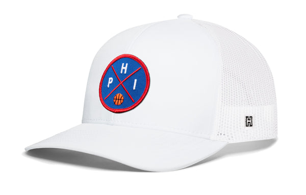 White trucker hat with front basketball logo patch, mesh sides, and small H emblem