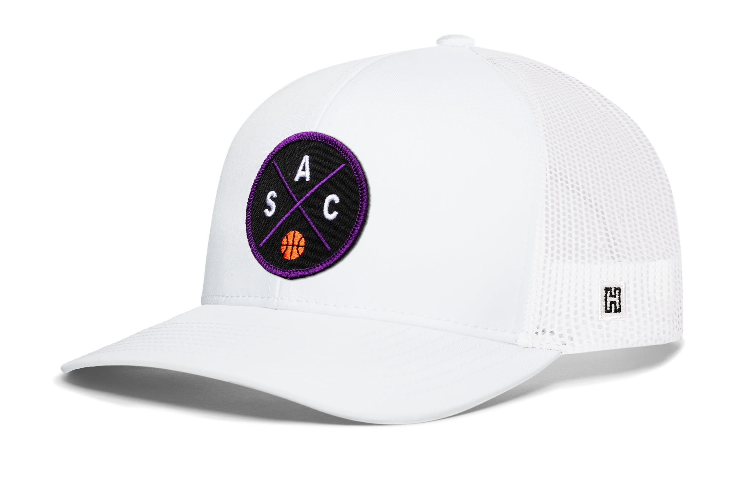 White basketball trucker hat with mesh back and purple circle logo on front