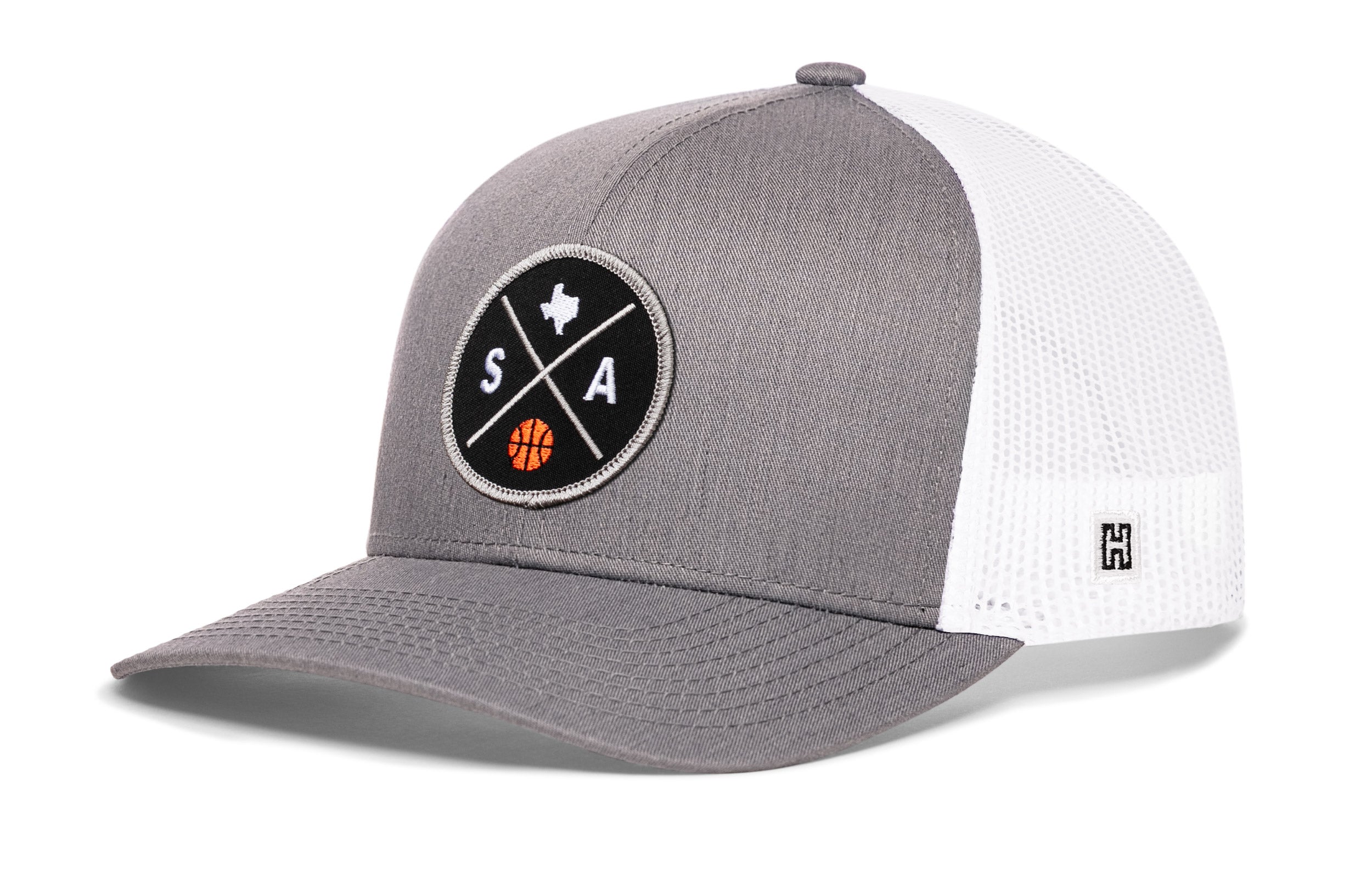 Gray trucker hat with white mesh back, front round SA logo patch, and side H logo