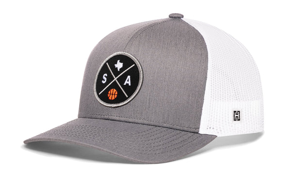 Gray trucker hat with white mesh back, front round SA logo patch, and side H logo