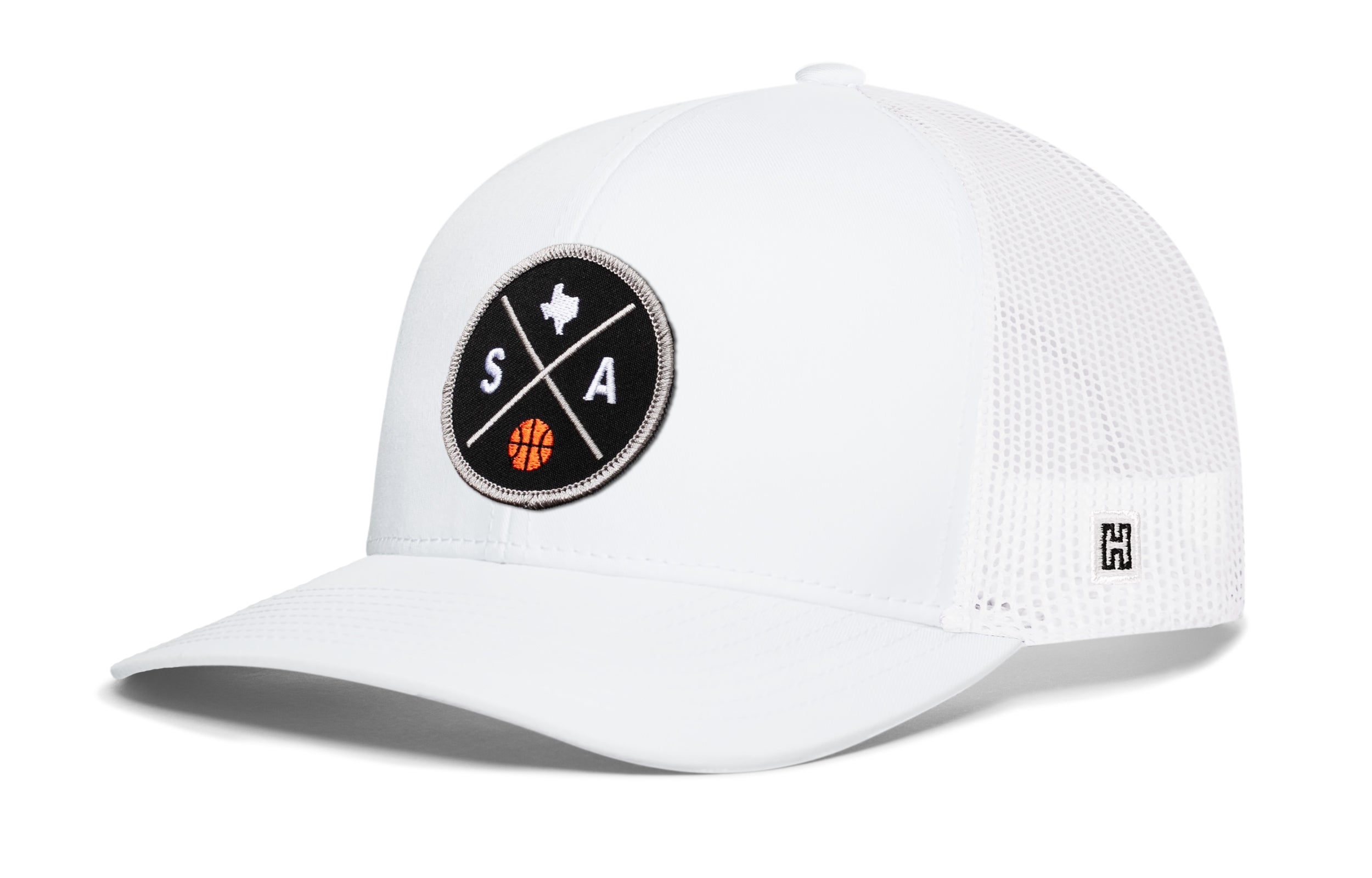 White trucker hat with mesh back, front circular SA graphic patch, and side H logo