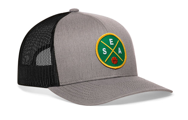 Gray trucker hat with circular basketball logo patch and black mesh side panels