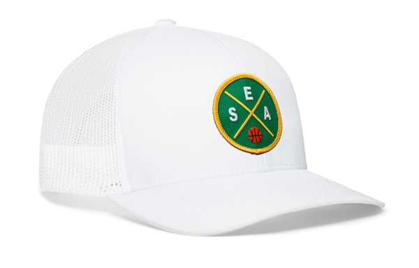White trucker hat with circular basketball logo patch and front curved brim