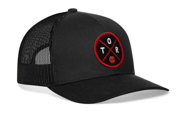 Black basketball trucker hat with circular logo patch, side mesh panels.