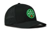 Black 5-panel basketball performance cap with circular green logo patch and perforated side panel