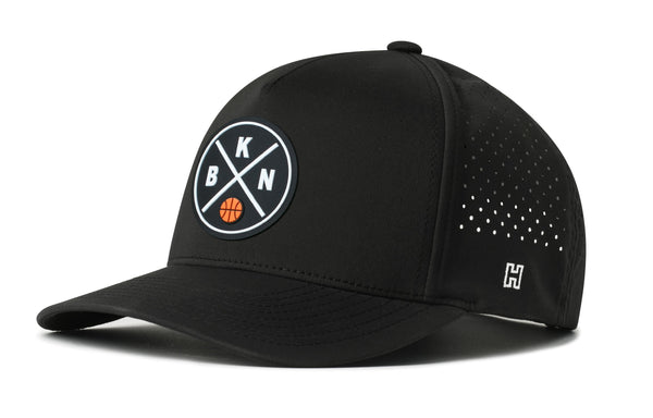 Black 5-panel basketball cap with mesh back, snapback, front logo patch and dotted side