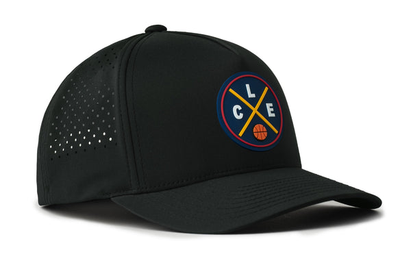 Black 5-panel snapback hat with circular team logo patch and perforated side panel.