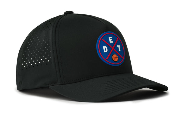 Black 5-panel performance hat with curved brim, logo patch, and small perforation pattern