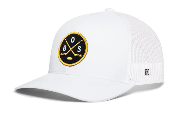 White hockey trucker hat with snapback, round front patch logo and side mesh panels